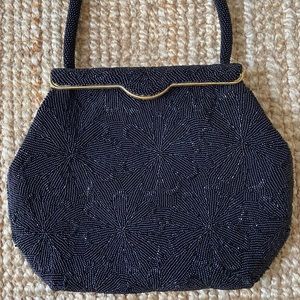 Vintage black flower beaded purse with spring close top